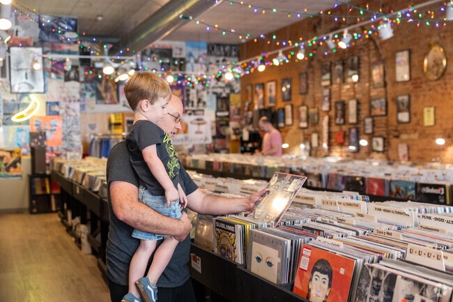 Original Townsite locals peruse Guestroom Records for the perfect find.