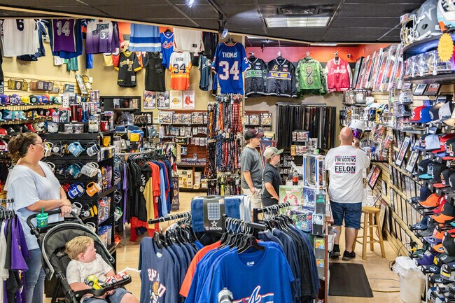Kids gather to talk sports at the B & C Sports Inc. shop just outside the Hollins neighborhood.