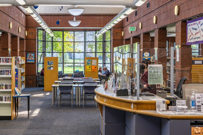The Glenwood Public Library provides a tranquil spot for book lovers near Rainbow-Meadowood.