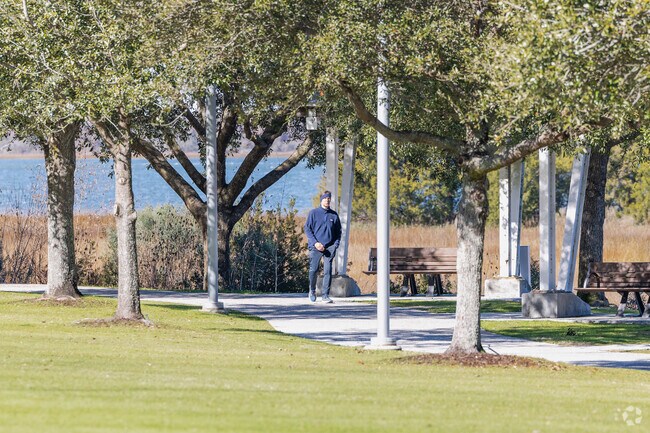 Mount Pleasant Memorial Waterfront Park has tree shaded trails for residents to walk.