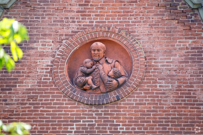 A stone of St Vincent himself, on Saint Vincent Academy building, in Jackson, Newark NJ.