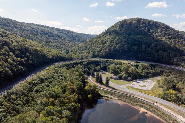 Unpaved hiking trails wind around the Horseshoe Curve, including Horseshoe Curve Mountain Trail.