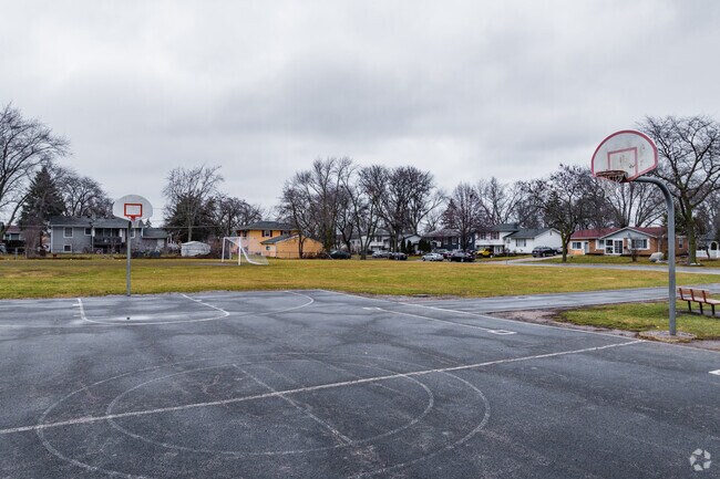 Laurel Hill Elementary School features an asphalt basketball court.