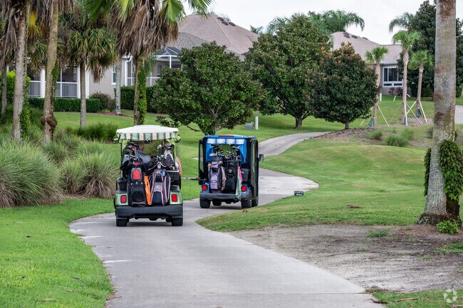 Village of Amelia residents ofter prefer to travel about using their golf carts instead of cars.