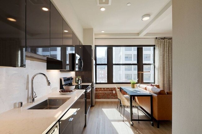 Oversized windows and roller shades in some homes*