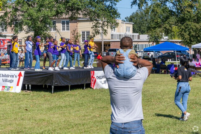 At the Mobile-Bouie Street Fest, visitors enjoy live performances and delicious treats.The o