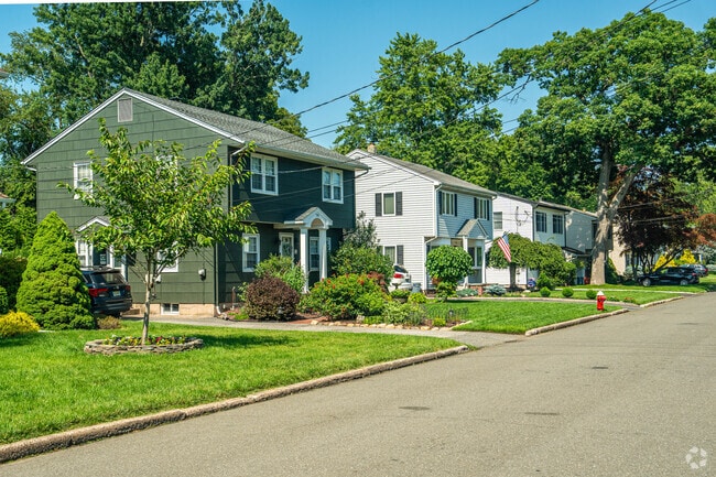 A row of Colonial-style homes in River Vale, New Jersey.