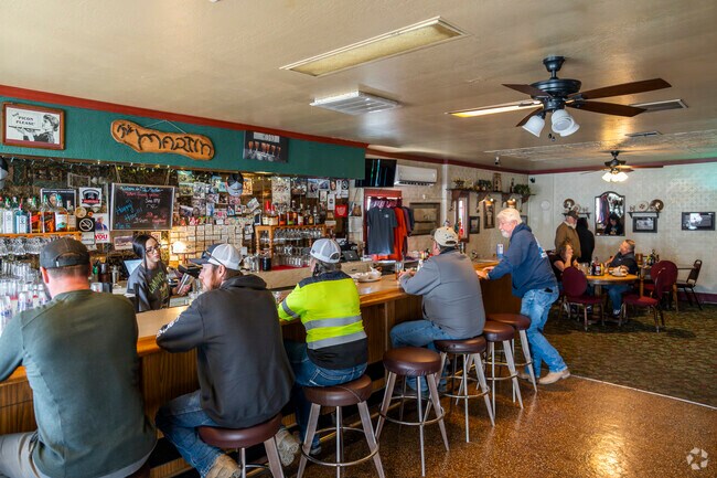 The Martin Hotel is a community gatherig space in Winnemucca with locals frequenting the bar and diners sharing dinner plates in the restaurant.