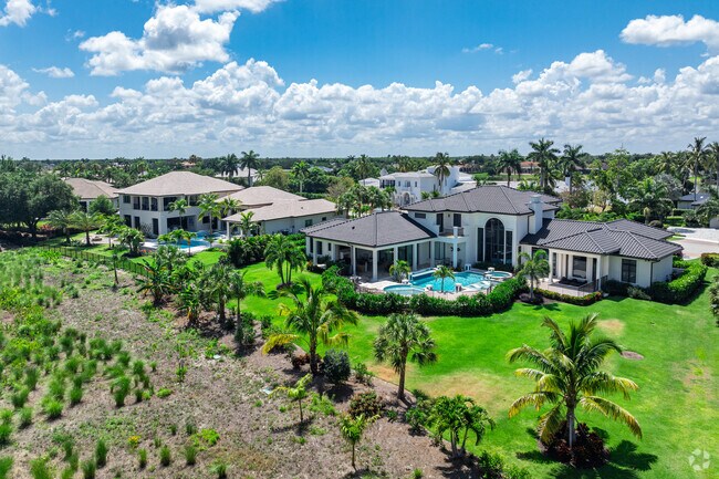 Quail West homes feature large backyards with private swimming pools.