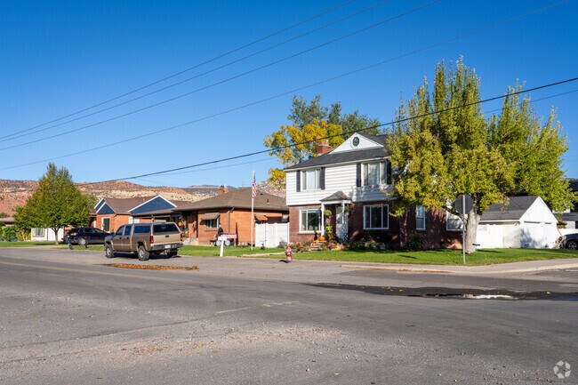 Two-story colonial-style homes with manicured yards pepper Richfield streets.