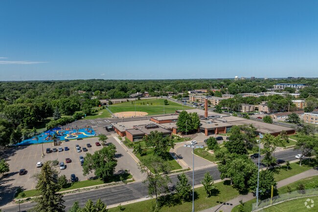 Aquila Elementary School has a large recess area and sports fields.
