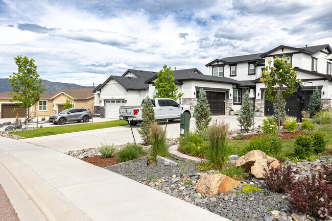 There are large multistory homes in the Woodmoor neighborhood.