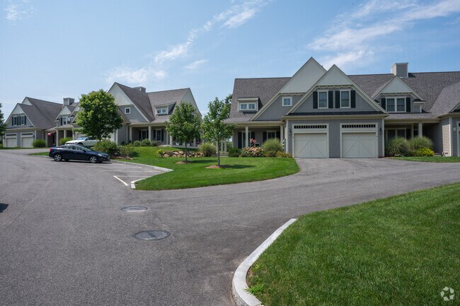 A row of townhouses overlooks Buzzards Bay in Cataumet.
