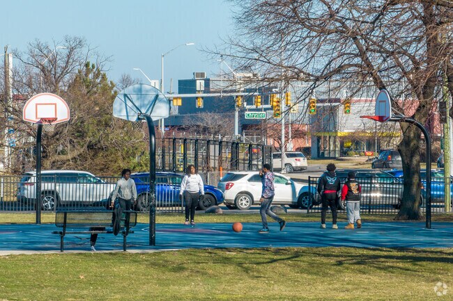 Brush Park kids enjoy afternoon basketball at Tolan Park on Mack Avenue.