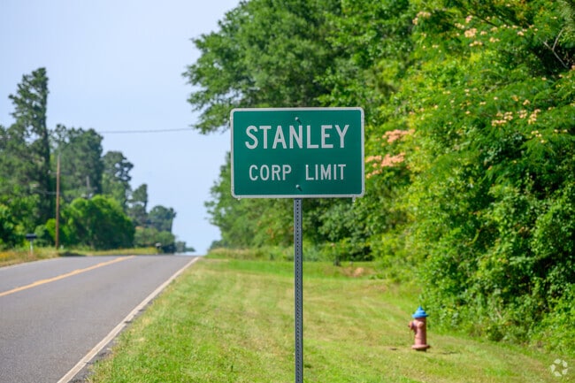 A city limit sign marks the quiet entrance into Stanley, welcoming you to small-town Louisiana.