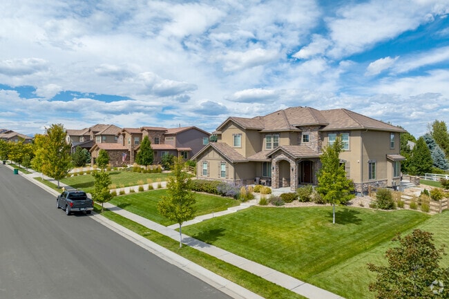 Huntington Trails showcases custom homes with manicured lawns.