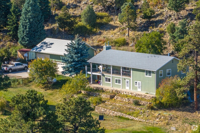 Spacious Mountain Meadows farmhouses offer a blend of country living and modern amenities.