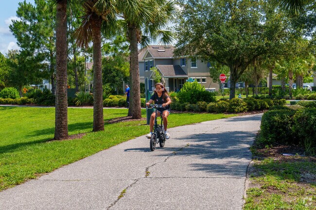 Randal Park's wide sidewalks make it a bike-friendly area for residents.