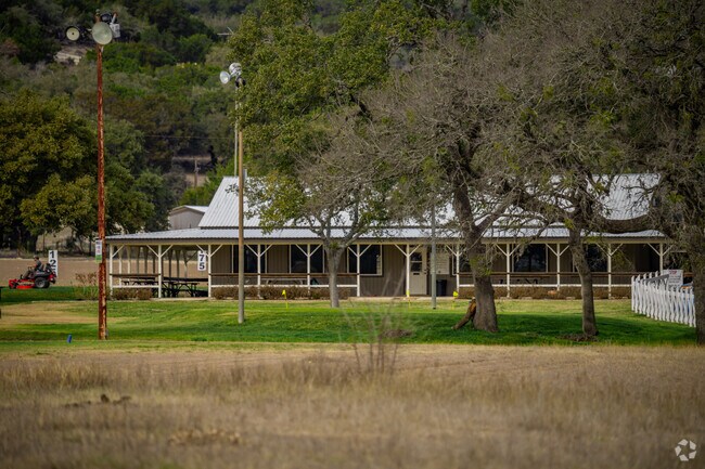 Locals enjoy a round of golf amid the hill country scenery at Oak Valley Golf Course.