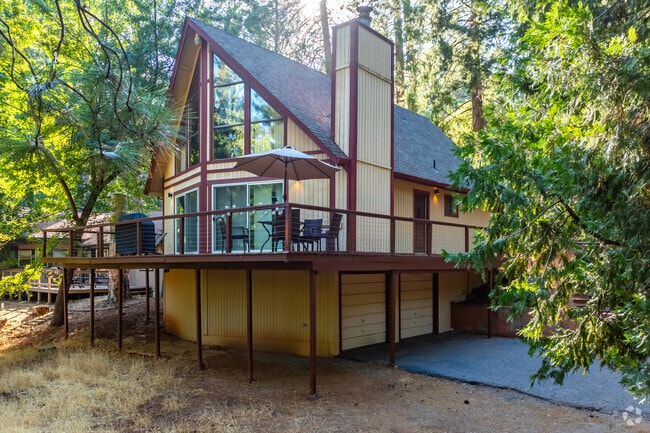 Deck houses sit peacefully on hillsides in Buckhorn, CA.