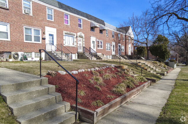 Many homes in the Yale Heights neighborhood are above sidewalk level.