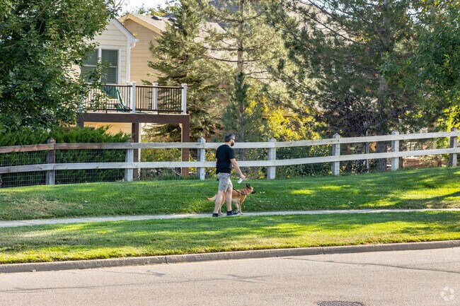 Dog-walkers love the walkable streets in the peaceful neighborhood of The Farm-Arapahoe.