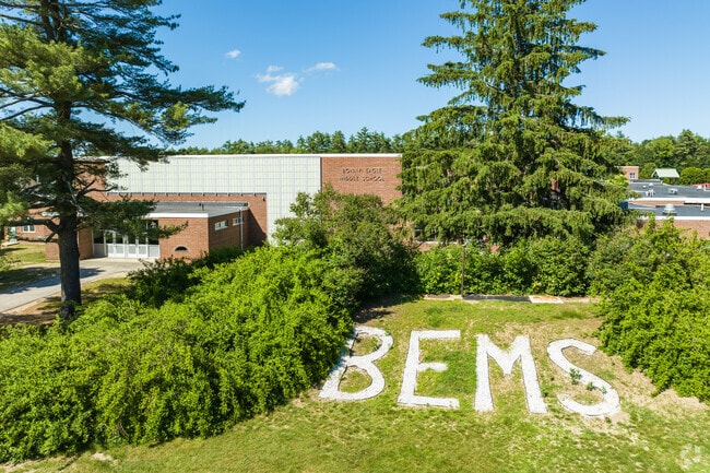 Large letters on the grounds of Bonny Eagle Middle School are visible from the air.
