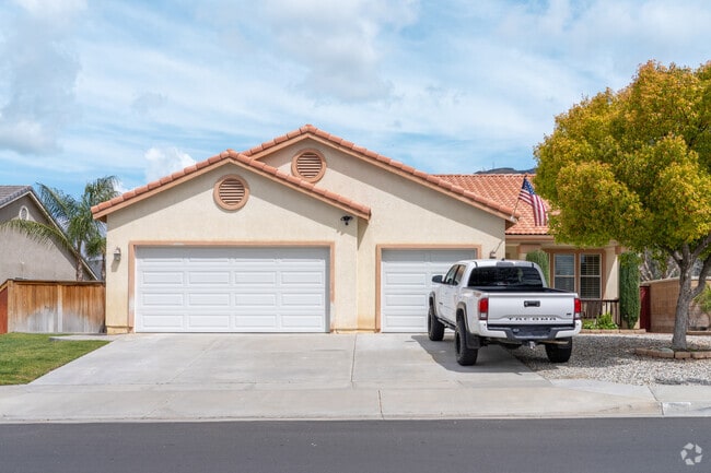 A beautiful Spanish-style home in Ramona, with its charming arches, tiled roof, and rustic elegance blending perfectly into the neighborhood’s scenic landscape.