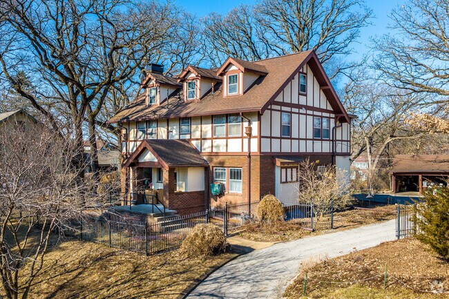 A beautiful Tudor sits perched atop a hill in the heart of Ingersoll Park.