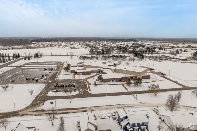 Washington Woods Elementary School is located in a neighborhood setting.