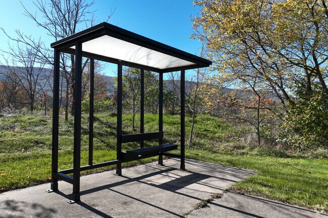 There are multiple locations in Harris along 322 to grab a bus and get into the Penn State area.