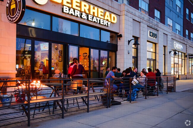 Diners sit outside Beerhead Brewery in Strong on a warm winter evening.