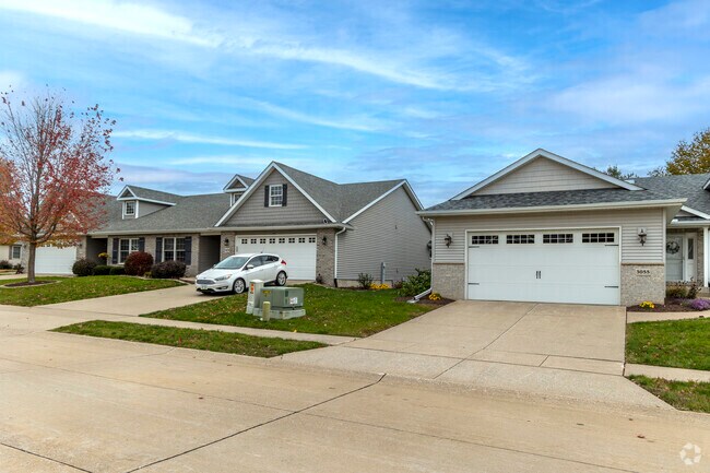 A row of modern prairie style homes in Stoney Creek.