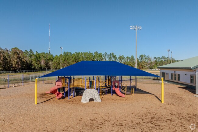 Playgrounds scatter Hickory Creek Elementary School keeping fun for all ages.