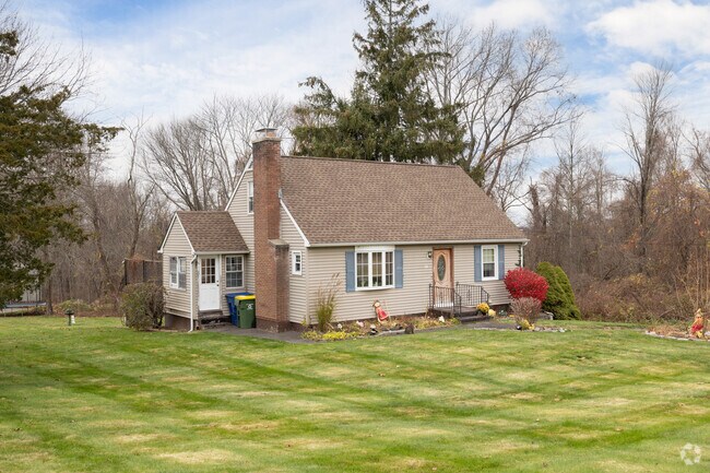 Cape Cod homes with spacious yards dot Bucks Hill’s quiet roads.