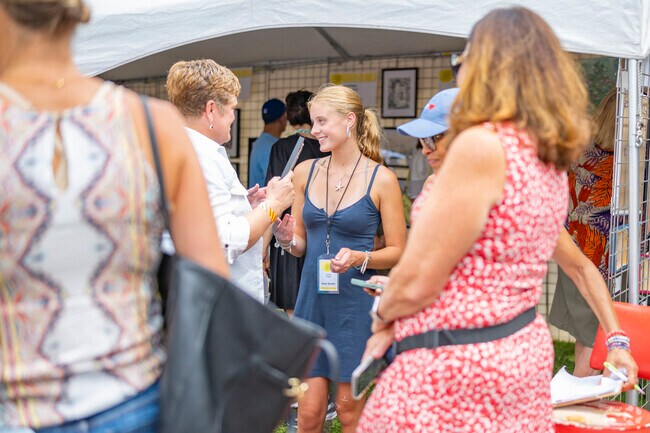 Young artists present original works at the Summer Art Market close to Speer.