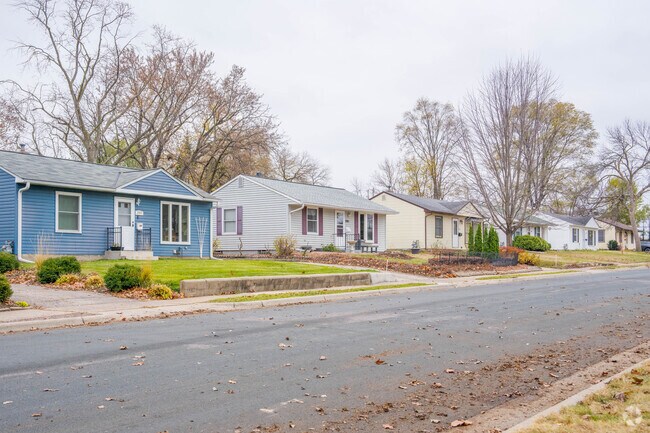 Rows of Rambler homes line the street in the Cobblecrest neighborhood.