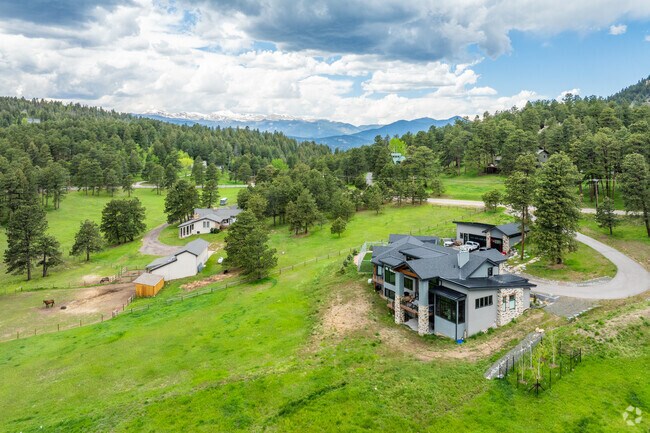 Many homes in North Turkey Creek sit on large lots and others can have views of the distant mountains.