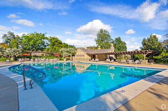 Experience Ultimate Relaxation In Greer Ranch's Stunning Pool Oasis