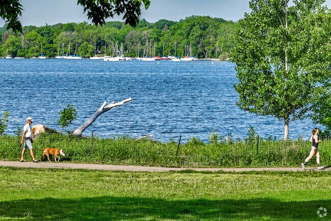 Lake Nokomis offers a scenic backdrop for trail users.