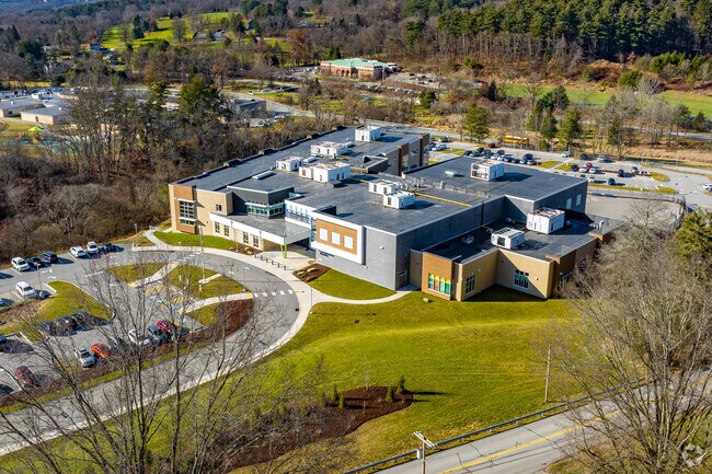 Franklin Regional Intermediate School has a large looped road at the front side of the building.