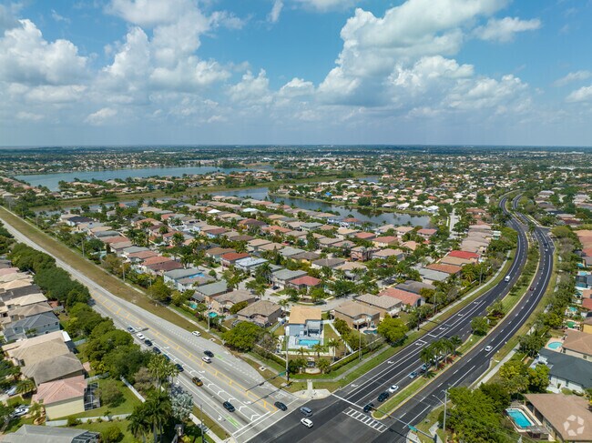 A gated community with single-family homes and townhouses in Pembroke Shores