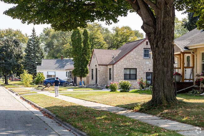 Haevers Corner is populated with large mature trees shading homes and sidewalks.