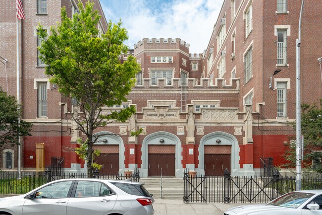 The main entrance to Academy for Excellence in Leadership is located on Irving Ave.