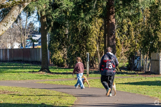 Residents of the Burton Ridge neighborhood enjoy the paved paths at Oakbrook Park.