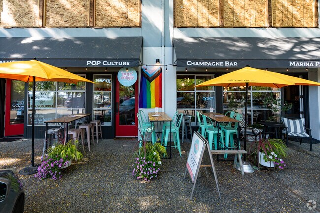 Enjoy a glass of bubbles at Pop Culture Champagne Bar in Norkirk