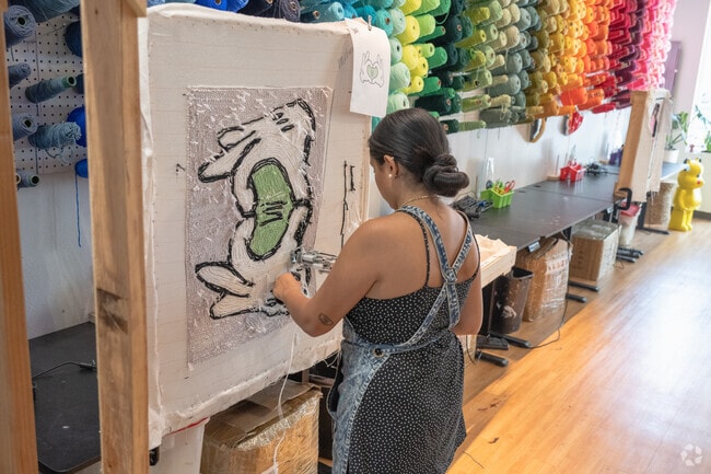 The Village of Centennial Springs near Painted Desert is home to local cafes, unique shops, and a creative studio.