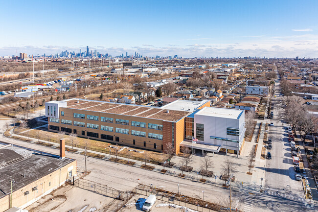 Aerial view of Calmeca Academy Elementary School and its surrounding area.