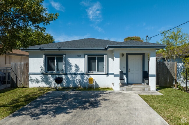 Single story cottages are common in Brownsville, and some have small porches.