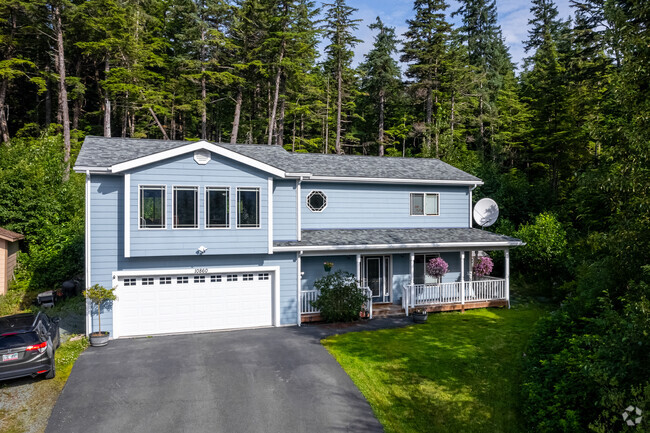 Many North Douglas residences are nestled among lush forests, offering privacy and scenic views.